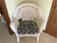 White wicker chair w/ cushion