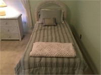 Wicker twin size bed w/ bedding (a)