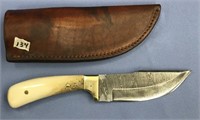 Damascus knife with a mammoth bone handle, handmad