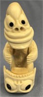 Ivory tupilak carved from whale's tooth: 3.5" tall
