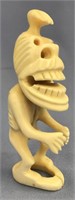 Ivory tupilak carved from whale's tooth: 4.25" tal