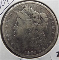 1904 Morgan silver dollar.