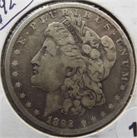 1892-O Morgan silver dollar.