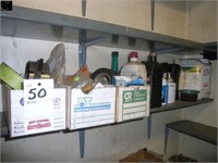 Shelf of misc. oils and lubricants, tape, lag