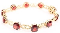 10K YELLOW GOLD GARNET FASHION BRACELET