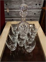 Set of 11 glasses and one crystal bottle