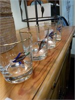 Set of 4 glasses with ducks in them