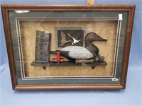 Shadow box frame with duck hunting memorabilia