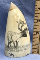 5" Scrimshawed whale's tooth by Eldred with a cari