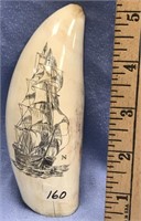 Scrimshawed whale's tooth 5.5" long with a sailing