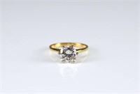 SOLITAIRE DIAMOND AND GOLD RING