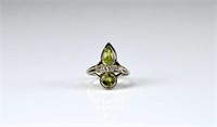 18K WHITE GOLD, PERIDOT, AND DIAMOND COCKTAIL RING