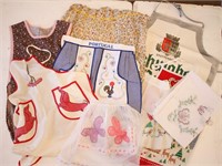 (8) Vintage Aprons & Hand Embroidered Tablecloth