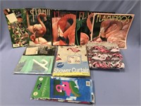 Flamingo shower curtains and assorted books