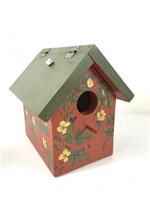 Painted wood birdhouse with swinging top