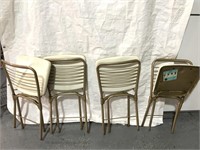 Four vintage Cosco chairs