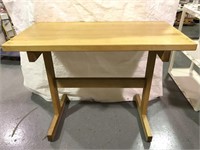 Large solid wood table/work station. Measures 48”