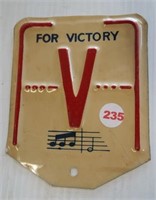 "V" for Victory metal sign. Measures 5.5" x 4.5".