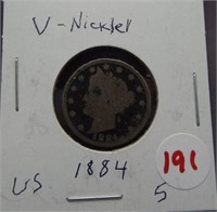1884 Shield nickel. Better date.