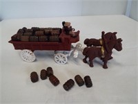 Cast iron horse and wagon whiskey barrel unit.