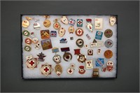 ~60 items: Soviet medals, lapel pins, books, etc.
