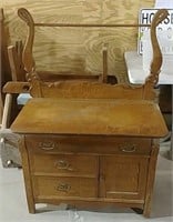 Commode with towel bar
