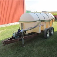 1025 gal poly tank on tandem axle trailer