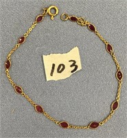 Beautiful bracelet, very delicate set with rubies,