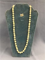 Ivory bead necklace 32" long       (a 7)