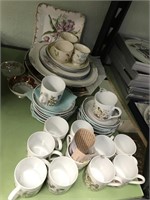 small cups and saucers and assorted plates etc.