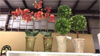 Pair fake orchids in a pair of fake boxwoods,