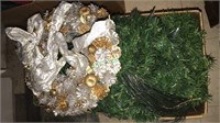 Box a lot of Christmas garland with lights, gold