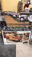 Holiday sleigh with decorative packages and