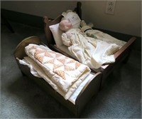 Lot, oak doll bed with 13" German porcelain