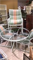 Patio table and three matching chairs with nice