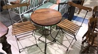 Pair of café chairs and matching table, the