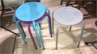 Set of four colorful metal stools with