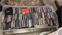 Large tub with a lid full of CDs including Eric