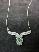 ORNATE GREEN AND CLEAR STONE NECKLACE