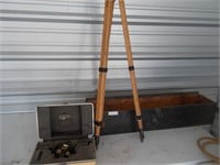 Wooden tripod and leveling instrument.