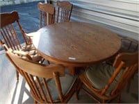 Dining room table with 6 chairs.