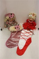 PAIR OF PRECIOUS MOMENTS DOLLS WITH STOCKINGS