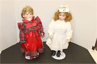 PAIR OF PORCELAIN DOLLS WITH STANDS