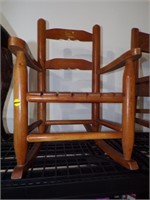 SMALL CHILDS ROCKING CHAIR IS ABOUT 23" TALL