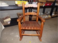 SMALL CHILDS ROCKING CHAIR IS ABOUT 22" TALL