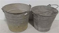 Two galvanized buckets