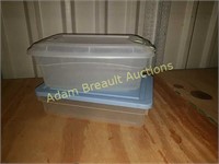 Two small plastic storage totes