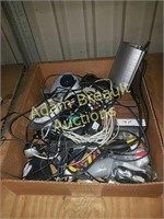 Box of assorted electronics and audio cables