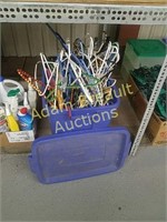 Hangers and Rubbermaid tote
