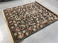 LARGE BLACK GOLD AND RED RUG
